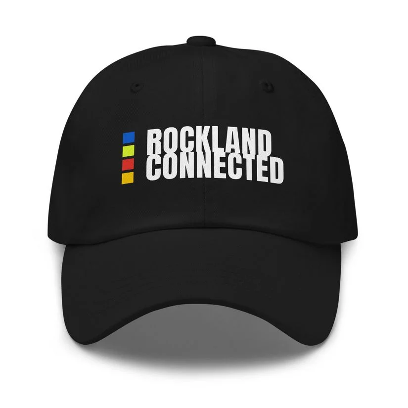 Black Rockland Connected hat with white stacked lettering and blue, lime, red, and yellow squares